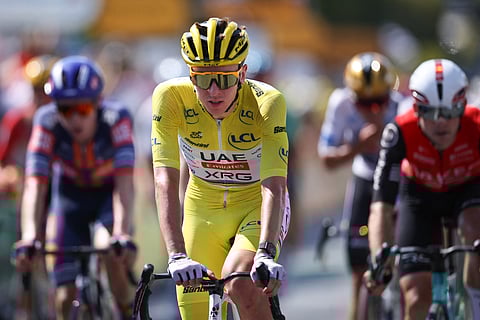 UAE Team Emirates - XRG team's Slovenian rider Tadej Pogacar wearing the overall leader's yellow jersey cycles to the finish line of the 9th stage of the 112th edition of the Tour de France cycling race, 174.1 km between Chinon and Chateauroux, central France, on July 13, 2025.