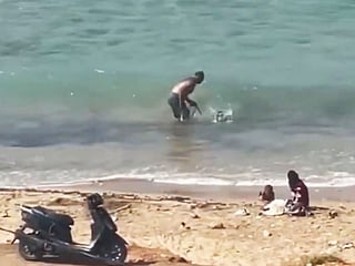 Caught on camera: Man beats dog on Lebanon beach in viral video, sparks outrage 