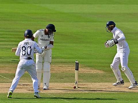 India's Mohammed Siraj watches the ball roll back on to the stumps to signal England's win in the third Test at Lord's on Monday.