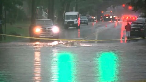 This image made from video shows a flooded street in Rahway, N.J., on July 14, 2025.