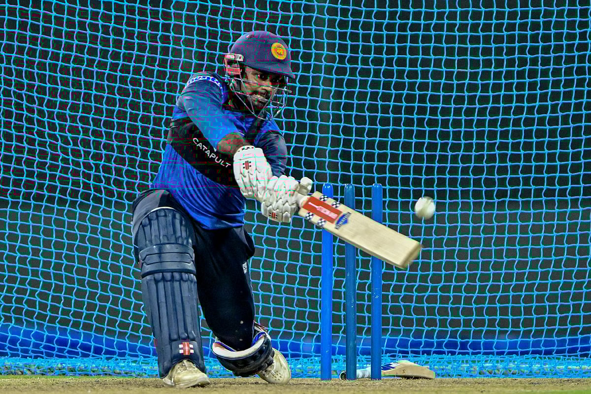 Sri Lanka's captain Charith Asalanka bats in the net during a practice session at the R. Premadasa International Cricket Stadium in Colombo on July 15, 2025, on the eve of the third and final Twenty20 international cricket match against Bangladesh.