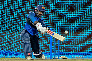 Sri Lanka's captain Charith Asalanka bats in the net during a practice session at the R. Premadasa International Cricket Stadium in Colombo on July 15, 2025, on the eve of the third and final Twenty20 international cricket match against Bangladesh.