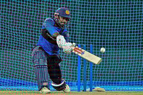 Sri Lanka's captain Charith Asalanka bats in the net during a practice session at the R. Premadasa International Cricket Stadium in Colombo on July 15, 2025, on the eve of the third and final Twenty20 international cricket match against Bangladesh.