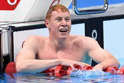 Britain's Tom Dean after winning the final of the men's 200m freestyle swimming event during the Tokyo Olympic Games. Now, he gets his name on board a Dubai real estate project. 