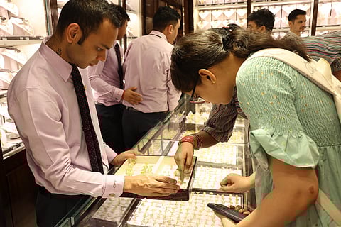 Dubai gold price was sticking to Dh370 plus levels even after the far-reaching US-EU trade pact. Can shoppers expect better in the coming weeks?