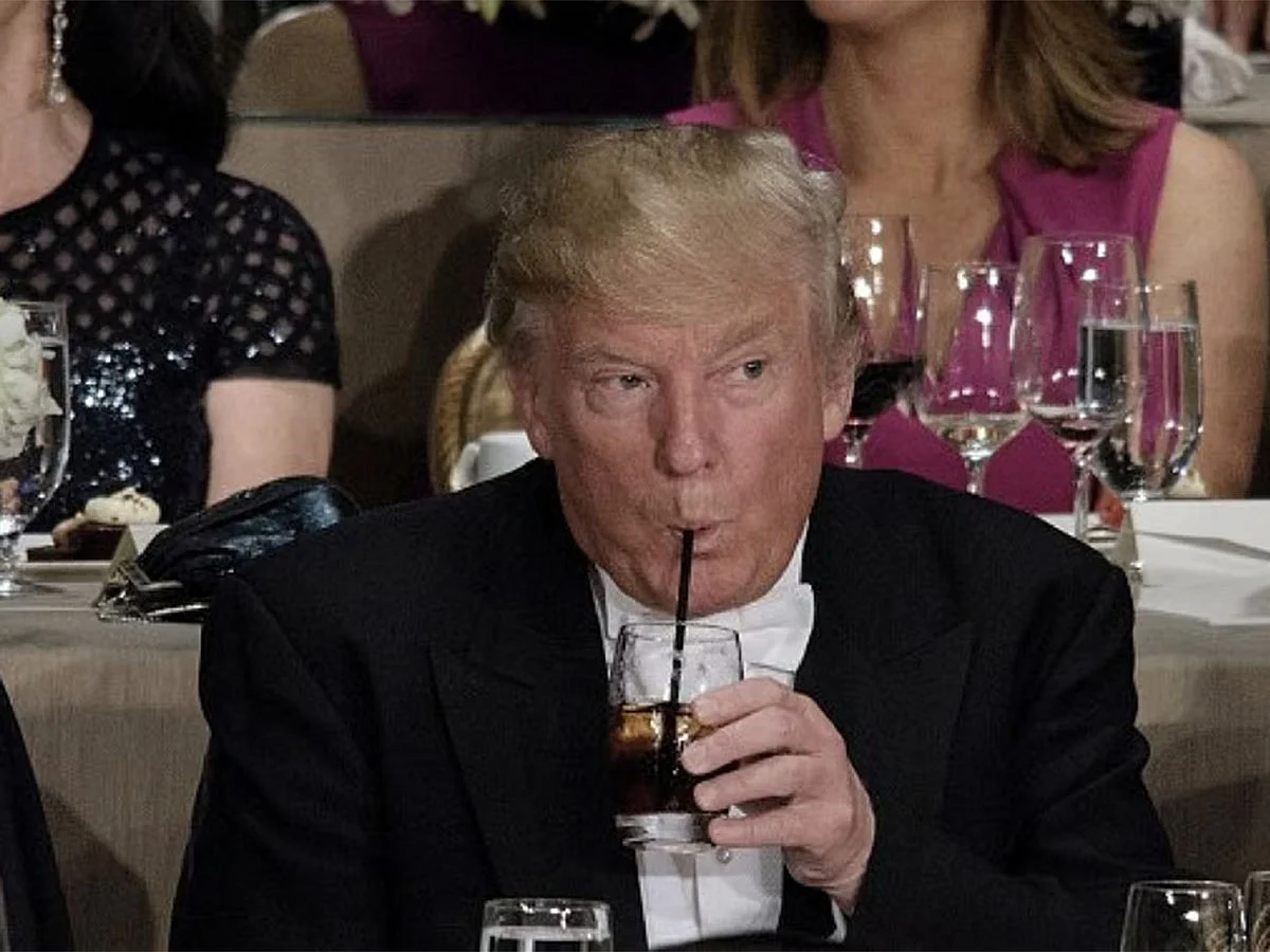 Donald Trump drinks a Diet Coke at the Al Smith Memorial Foundation Dinner in New York in 2016.