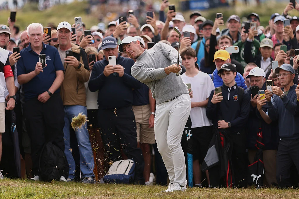 Rory McIlroy of Northern Ireland plays out of the rough on the 4th hole during the first round of the British Open golf championship at the Royal Portrush Golf Club, Northern Ireland, Thursday, July 17, 2025.