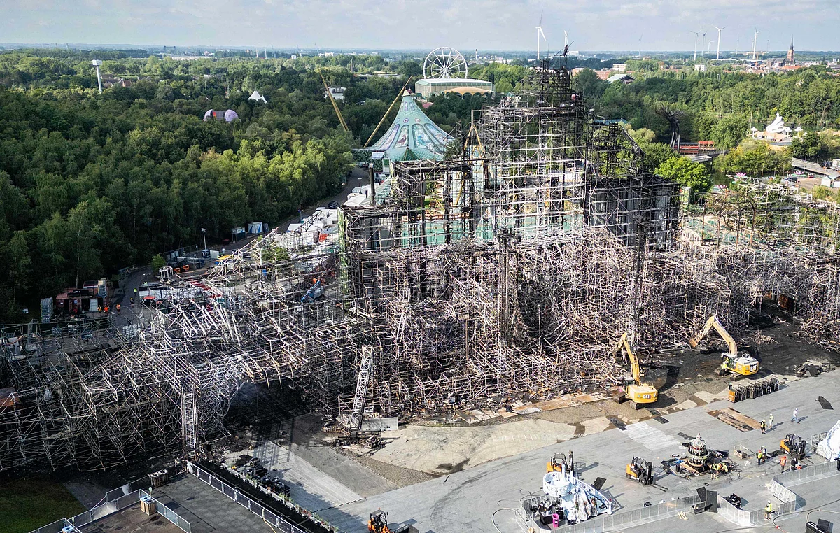 This aerial photograph shows the main stage of the Tomorrowland music festival that was totally destroyed by fire a day before thousands of electronic dance music lovers were due to descend on the Belgian event in Boom, near Antwerp, on July 17, 2025. 