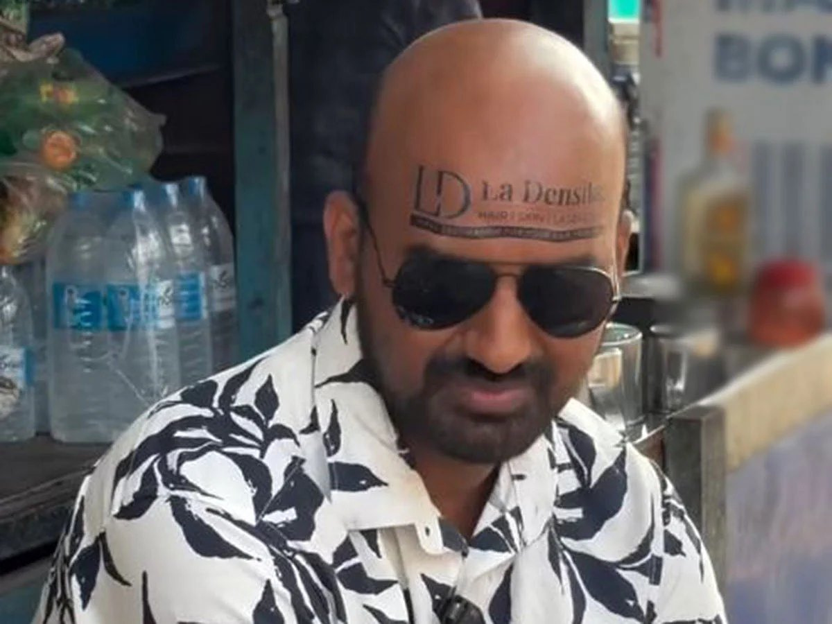 Kerala vlogger turns bald head into unique ad space
