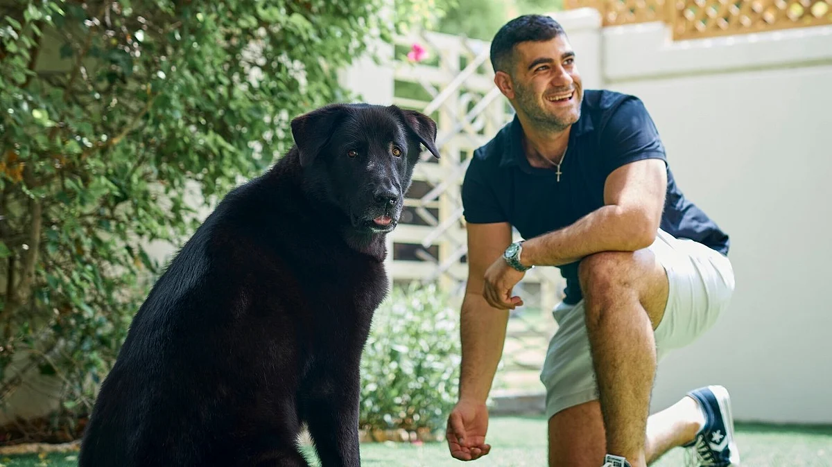 Joey Chaaya and his four-legged muse for PetBae Renzo.