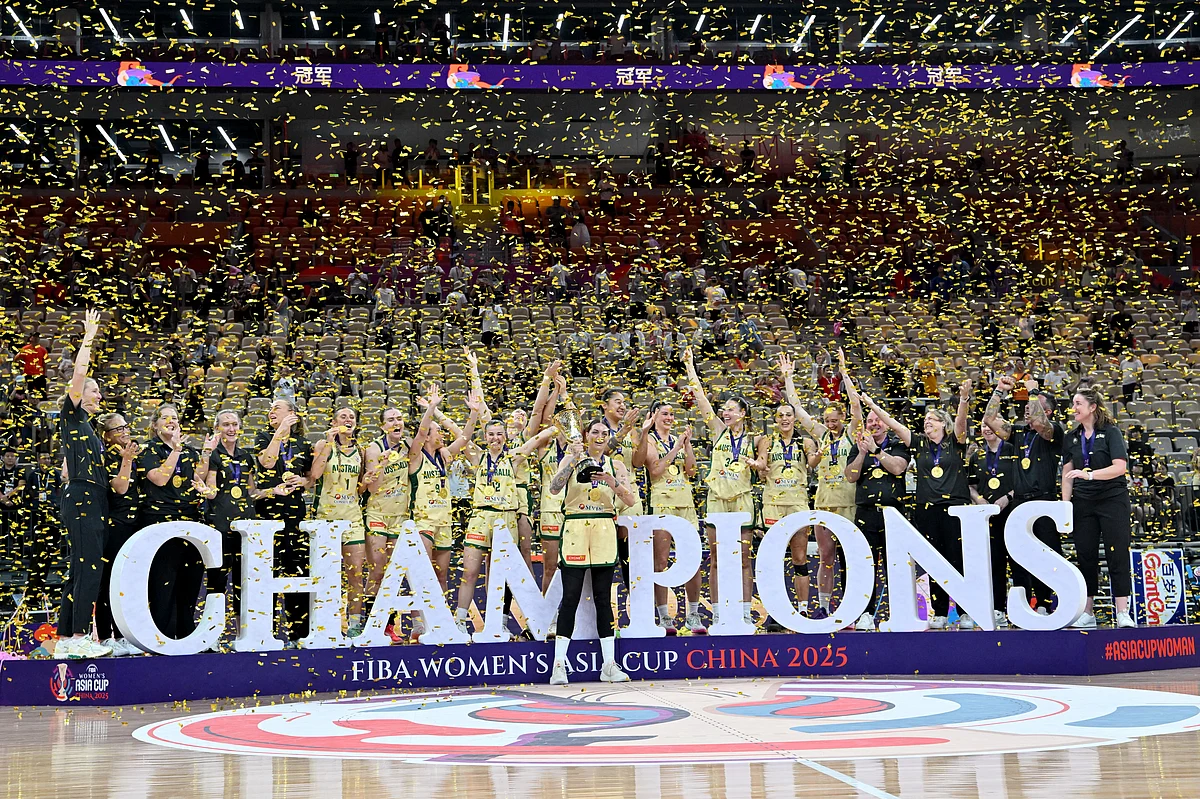 Australia's team celebrates with their trophy during an award ceremony at the 2025 FIBA Women’s Asia Cup basketball tournament in Shenzhen, China’s southern Guangdong province on July 20, 2025.
