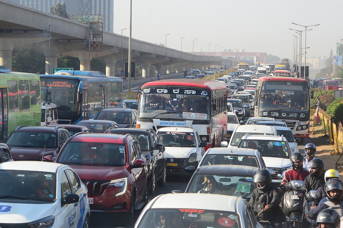 A typical day in Bengaluru, where time ticks more slowly in traffic. Endless honking, stalled cars, and frustrated faces paint a daily portrait of a city growing faster than its roads can handle. Progress paused at every red signal.