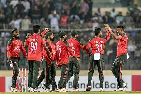 Fast bowlers Taskin Ahmed and Mustafizur Rahman rocked Pakistan for 110 before opener Parvez Hossain hit an unbeaten 50 as Bangladesh won the first Twenty20 international by seven wickets in Dhaka on Sunday.