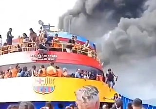 Five dead as Indonesian ferry with 280 onboard catches fire; passengers leap into sea
