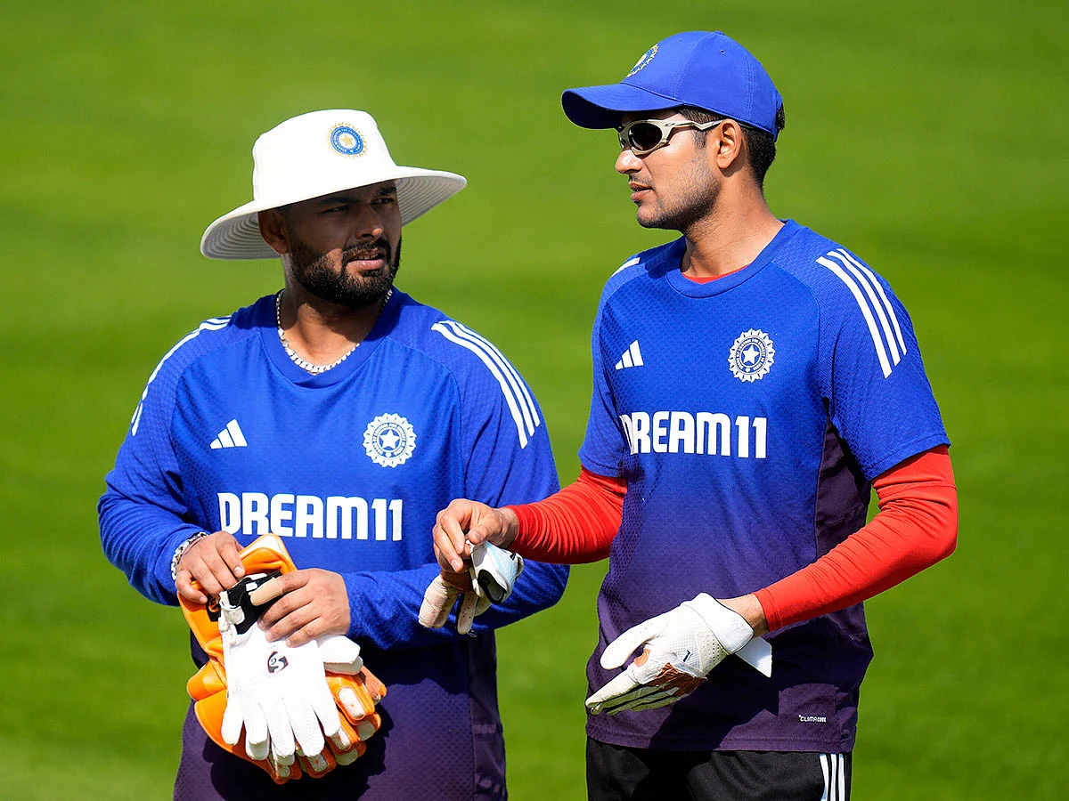 India skipper Shubman Gill (right) and his deputy Rishabh Pant discuss a strategy during a nets session at Emirates Old Trafford on Monday.