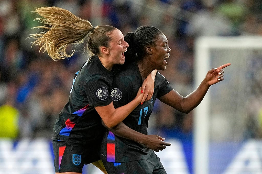 England's Michelle Agyemang, right, celebrates with Ella Toone after scoring her side's first goal during the Women's Euro 2025 semifinals soccer match between England and Italy at Stade de Geneve in Geneva, Switzerland, Tuesday, July 22, 2025.