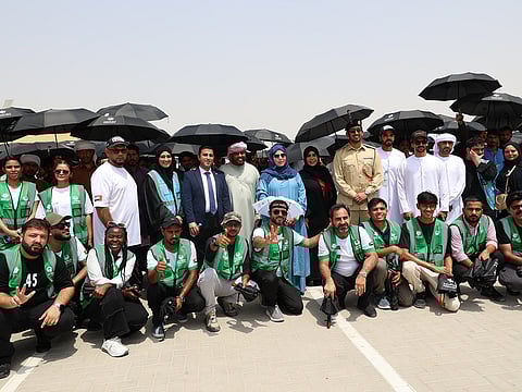 The event took place at Al Eyas Police Point, where participating labourers received not only umbrellas but also vital tips on preventing heatstroke and dehydration. 