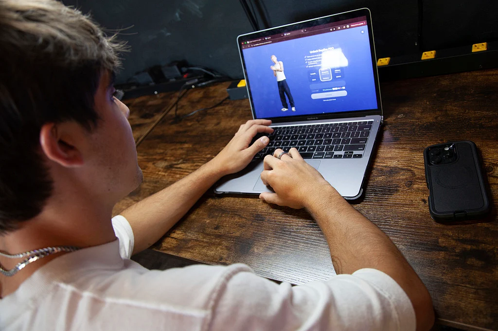 Bruce Perry, 17, demonstrates the possibilities of artificial intelligence by creating an AI companion on Character AI, Tuesday, July 15, 2025, in Russellville.  