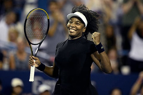 Venus Williams celebrates her win over Peyton Stearns during a match at the Citi Open tennis tournament Tuesday, July 22, 2025, in Washington. (AP Photo/Nick Wass)