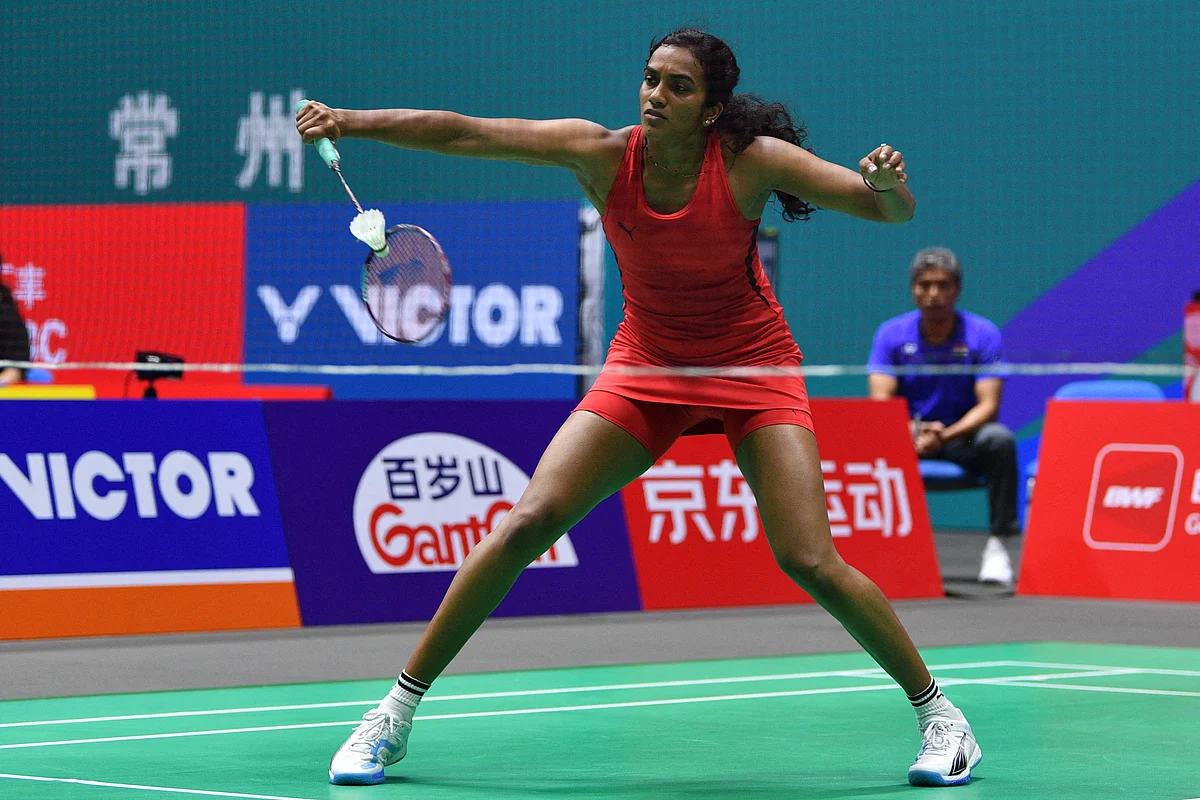 India’s PV Sindhu hits a return to Japan’s Tomoka Miyazaki during their women’s singles match at the China Open badminton tournament in Changzhou, in China’s eastern Jiangsu province on July 23, 2025.
