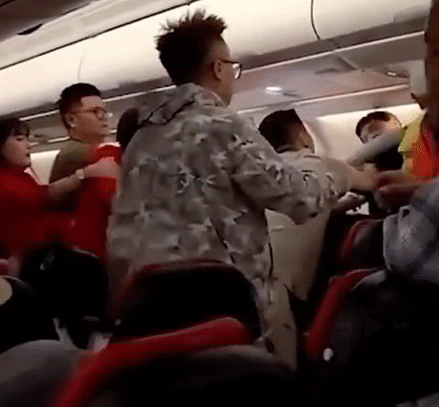 The trouble reportedly began after a male passenger confronted a group of women onboard for “talking loudly” after cabin lights were dimmed.