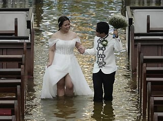 Love triumphs over floods: Filipino couple weds amid typhoon chaos