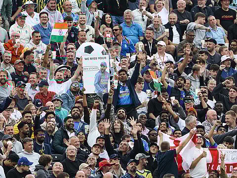 Supporters cheer on day one of the fourth Test between England and India at Old Trafford in Manchester on Wednesday.