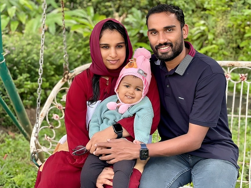 Aiza Mariyam with her parents Naeema and Hyder. Over the past five years, proud parents have centered their routines on Aiza’s therapy and education, aiming to give her a happy and healthy life.