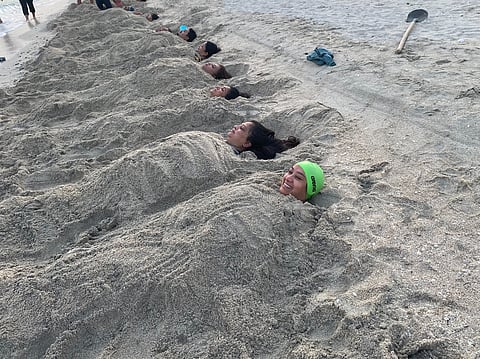 Some of the Sharjah Goans during a recent  mud bath session.