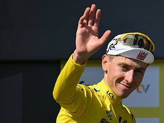 Tadej Pogacar leads peloton into Paris for Tour de France climax