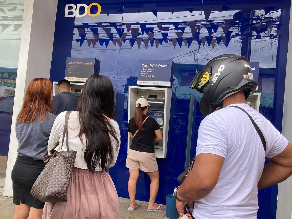 The peso's decline in the last three months (May to July 2025) reverses  its relatively stable performance, earlier in the year. Photo shows customers forming a beeline to a local ATM machine. 