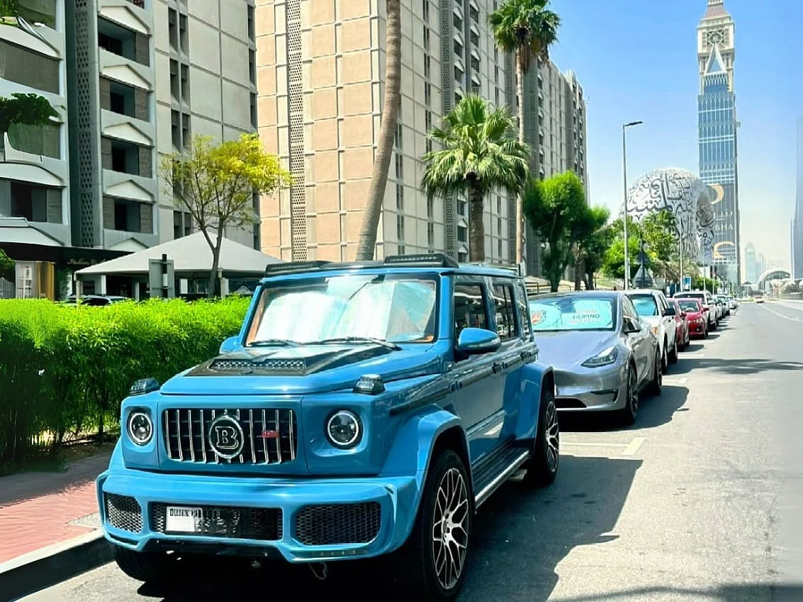 It's a head-turning 4WD monster with a Brabus kit, wrapped in a rare bluish finish and bold orange leather inside.