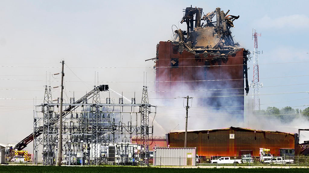 Firefighters battle a fire after an explosion in an industrial area in Fremont, Nebraska.
