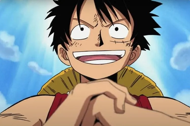 At the front are Luffy, Zoro, Sanji, and Nami, with Roger, Rayleigh, and Gaban positioned behind them. The rest of the Straw Hats make smaller appearances, cleverly nestled in Luffy’s pockets or perched on him.