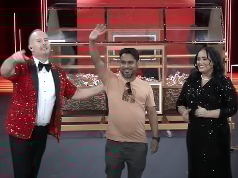 July 3 winner Mohammed Naser Balal with show hosts Richard and Bouchra during the Big Ticket draw on August 3.