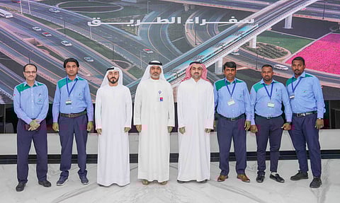 Arabia Taxi drivers with RTA officials during the honouring ceremony in Dubai