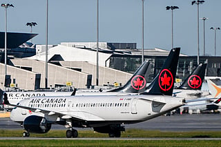 A former Air Canada captain is under investigation for flying large passenger aircraft without the necessary licence.
