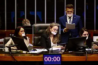 Lawmakers tape mouths to protest Bolsonaro arrest