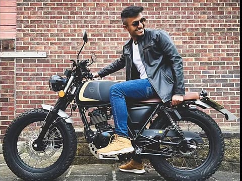 Jefferson Justin in his old bike. He reportedly died after his latest bike, a compact street bike with a single seat, skidded and hit a wall while he was returning from work in Leeds.