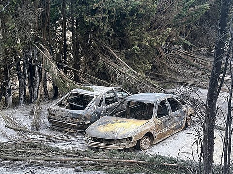 Charred cars are pictured after France's biggest wildfire broke out, near near Durban-Corbieres, southern France.