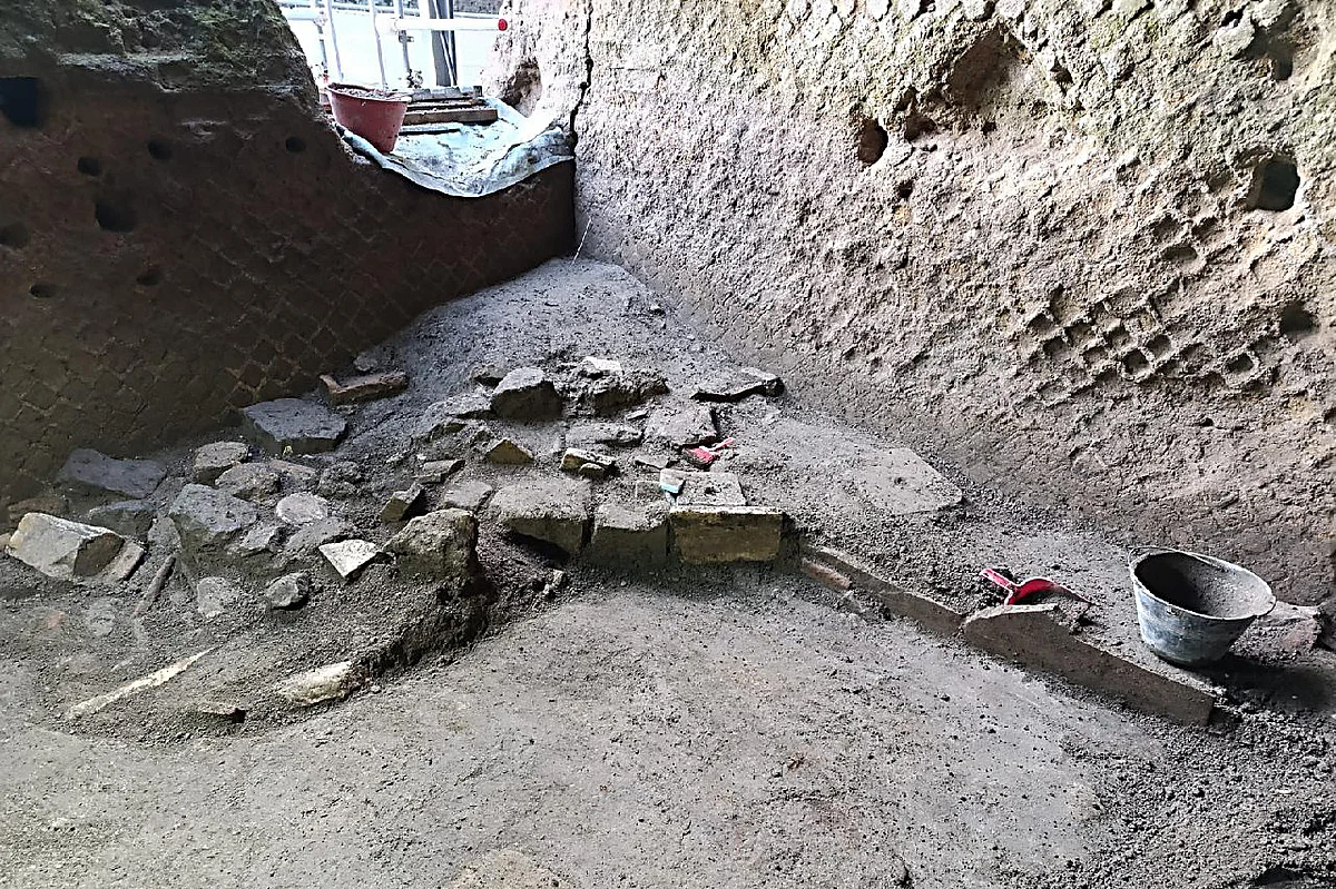 This handout photograph taken and released by the Pompeii Archaeological Park on August 6, 2025, shows new discoveries at Pompeii, where archaeologists have uncovered new evidence indicating the reoccupation of Pompeii following the eruption of Mount Vesuvius in 79 AD, which left the city in ruins.