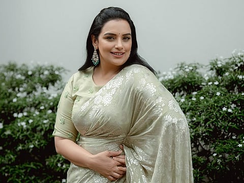 Shwetha Menon strikes a pose in happier times. Now, the Malayalam film actress and AMMA candidate for president finds herself in a tight spot.