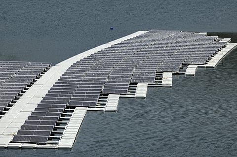 A floating photovoltaic solar installation in put in place on the Oued Rmel dam, as part of a solar pannel farm near the Tanger Med port in the province of Fahs-Anjra, west of the city of Tangiers on August 7, 2025.