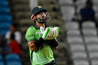 Mohammad Rizwan of Pakistan celebrates his half century during the first One Day International (ODI) cricket match between West Indies and Pakistan at Brian Lara Cricket Academy in Tarouba, San Fernando, Trinidad and Tobago on August 8, 2025.