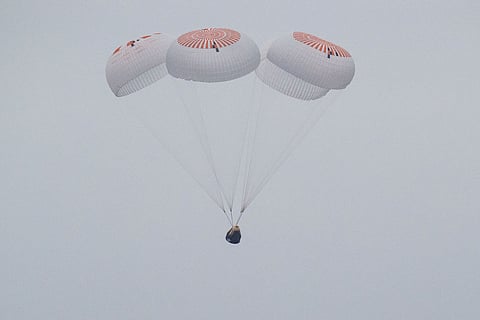 This picture provided by NASA shows the SpaceX Crew Dragon Endurance spacecraft as it lands with NASA astronauts Anne McClain and Nichole Ayers, Japan Aerospace Exploration Agency (JAXA) astronaut Takuya Onishi, and Roscosmos cosmonaut Kirill Peskov aboard in the Pacific Ocean off the coast of San Diego, California, on August 9, 2025.
