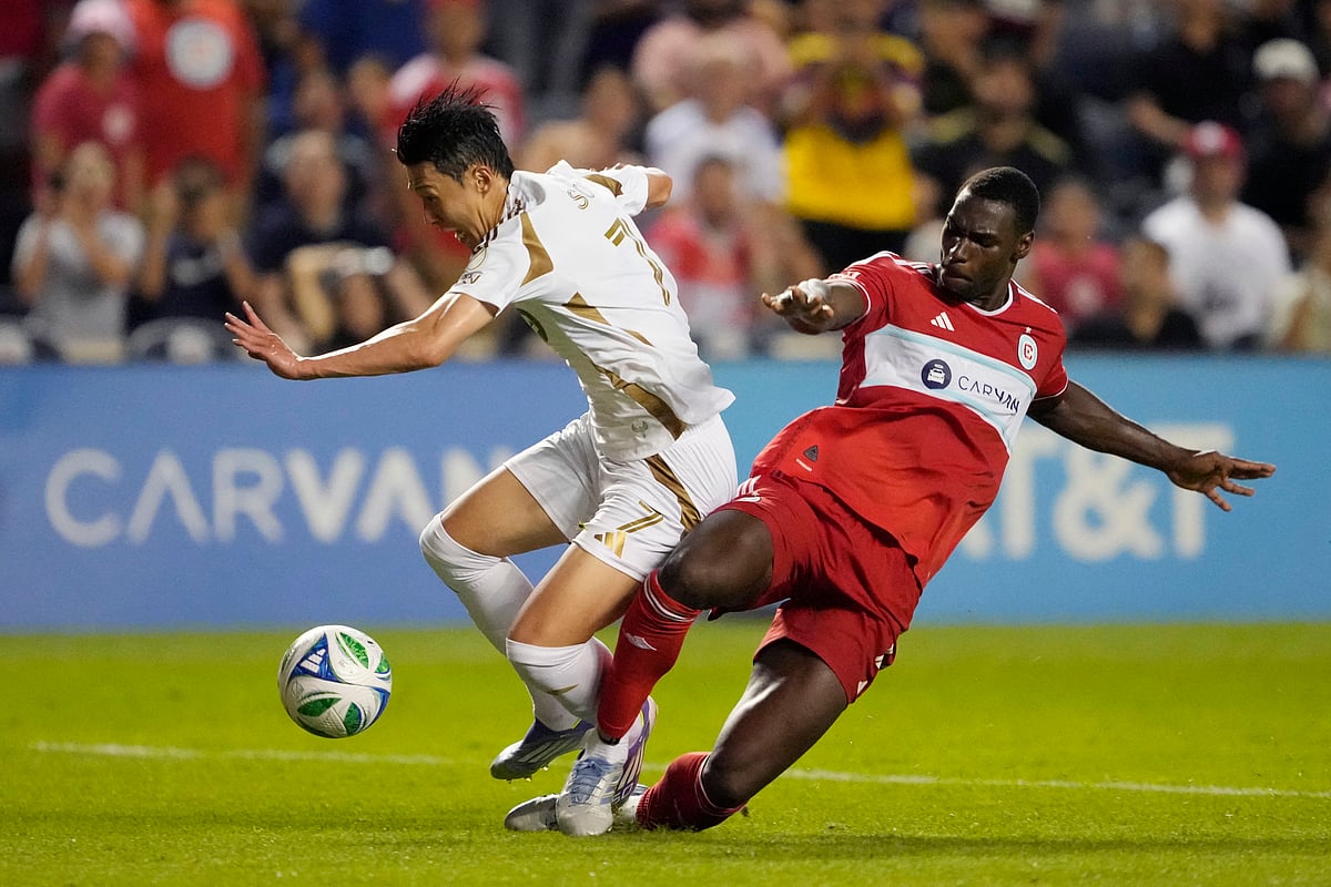 Carlos Teran of the Chicago Fire FC makes a foul Son Heung-Min of Los Angeles FC during the MLS match between Chicago Fire FC and Los Angeles Football Club at SeatGeek Stadium on August 09, 2025 in Bridgeview, Illinois.