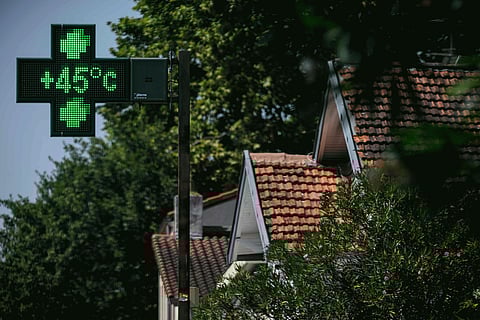 A pharmacy sign indicates a temperature of 45°C in Toulouse, southwestern France on August 11, 2025.  