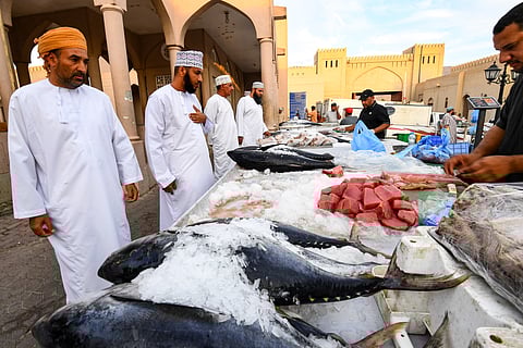 Omanis shopping for fish in the city of Nizwa, about 160 kilometres southwest of the capital Muscat. 