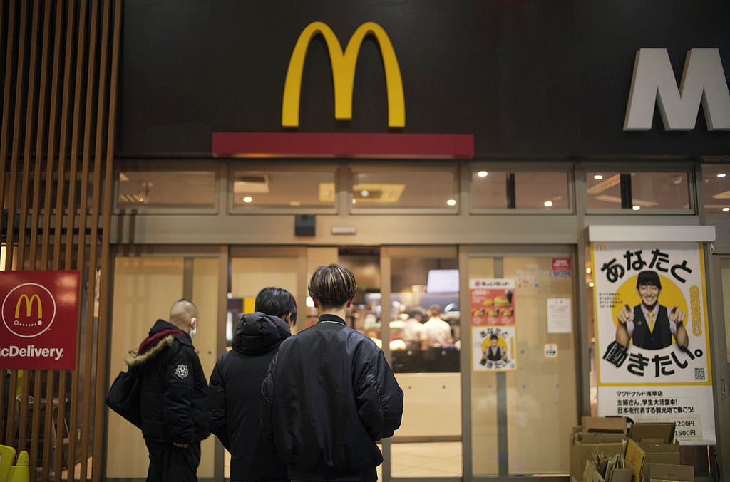 People stand outside a McDonald's store in Tokyo.