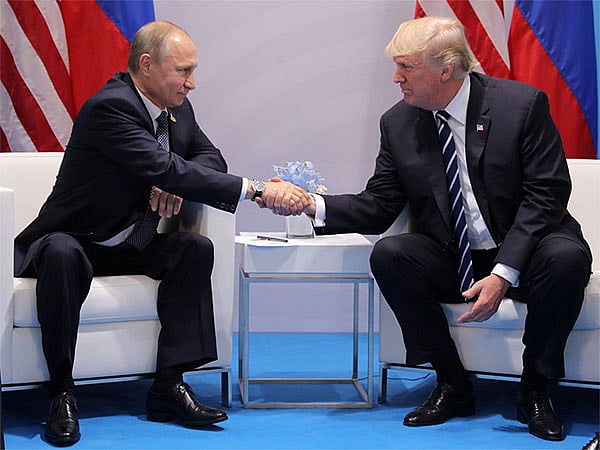 File photo: Vladimir Putin with Donald Trump